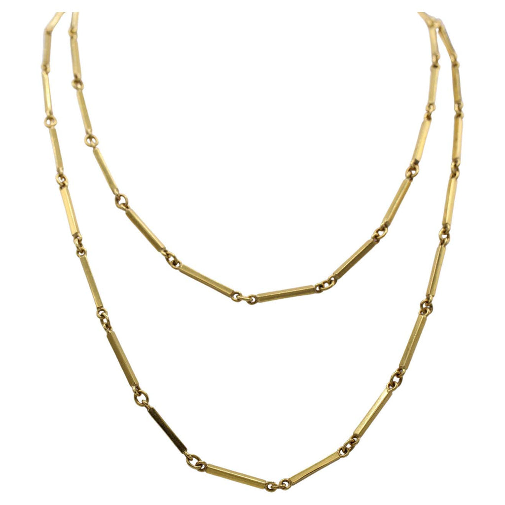 1980s 18 karat yellow gold long chain necklace.